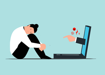 Shame - hand pointing out of a laptop screen at a lady