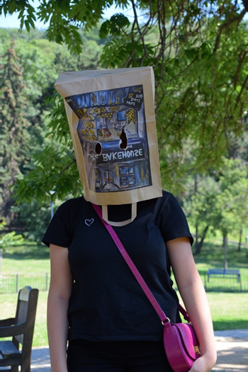 Image of a lady with a bag over her head
